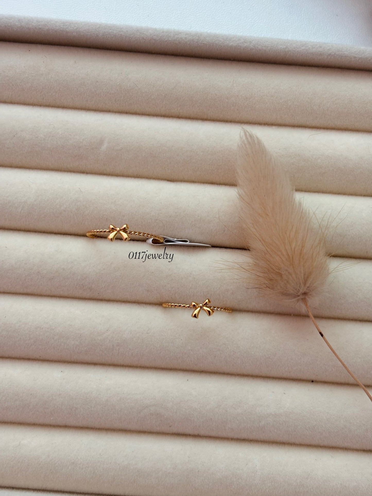 Tiny golden Bow ring