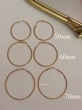 Golden hoops