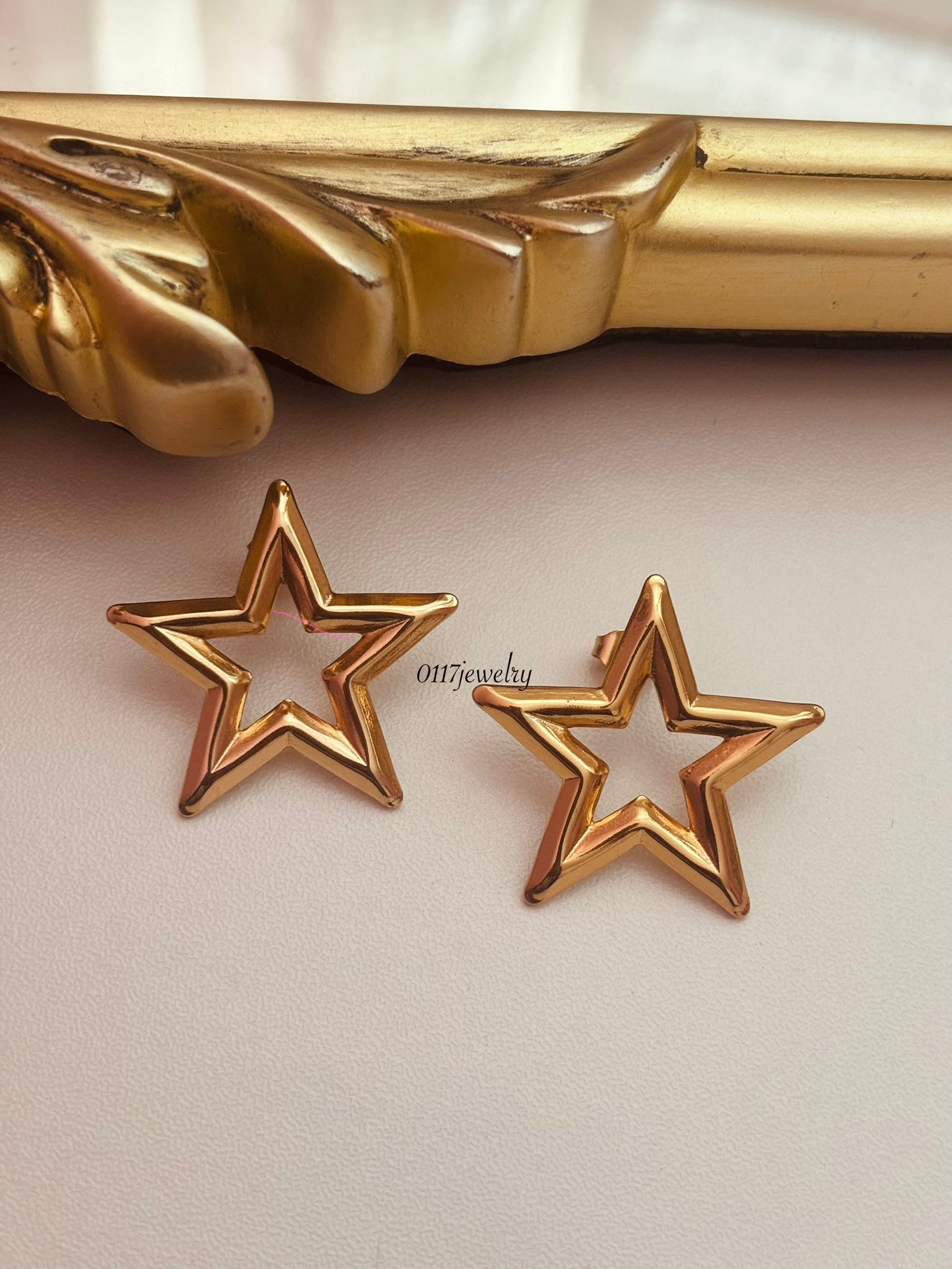 Golden star earrings